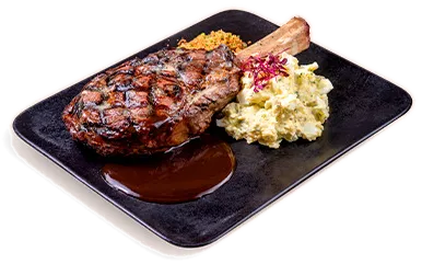 Prime rib de Angus feito na brasa, como servido na casa